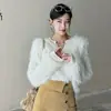 Colección de otoño/invierno 2026 estilo coreano transfronteriza: suéter de punto holgado, de manga larga, con cuello redondo y textura esponjosa para mujer