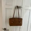 Bolso grande de alta moda retro estilo coreano para mujer, nuevo bolso de hombro casual para commuting 2026, bolso de mano tipo tote