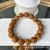 El fabricante suministra una colección de pulseras de hueso de durazno naturales, pulseras de hueso de durazno de círculo único para hombres y mujeres, populares en Xiaohongshu, con diseño de agujero pasante