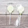 Venta al por mayor Vela de Lazo Individual Hermosa Decoración para Pastel Enchufe Rosa Blanco Caricatura Piruleta Vela de Cumpleaños