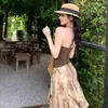 Viaje a Yunnan Xinjiang Pradera Retro Maillard Top Halter Cuello Falda Irregular Acampanada Media Falda para Mujer