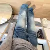 Jeans de Cintura Alta, Caimento Solto, Design Degradê, Levemente Flare com Lavagem Azul Vintage e Aspecto Desgastado, Calça Flare Versátil