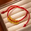Nuevo Estilo Chino Envoltura Antigua Fa Sha Pulsera Dorada Amarillo Dorado Dios de la Riqueza Marca Redonda Pulsera de Cuerda Roja Cintura de Hombres y Mujeres Línea de Cintura