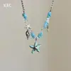 Collar de estrella de mar azul fresco de verano con piedra triturada y caracola metálica, cadena larga versátil para la clavícula para mujer