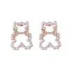 Outono e inverno Novos brincos de urso com pérolas design de nicho feminino agulha de prata S925 clipe de orelha pequeno fofo sem furo na orelha atacado