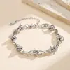Pulsera de cadena de acero inoxidable chapada en oro de 18k transfronteriza, pulsera de diseño de nicho estilo INS, joyería de acero de titanio de alta gama que no se decolora