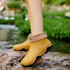 Botas de lluvia de moda para pareja transfronterizas Zapatos impermeables para exteriores de estilo coreano para mujer Zapatos de goma antideslizantes para cocina suela blanda cómodos Zapatos para lavado de autos mujer