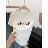 Camiseta Blanca de Algodón con Cuello Redondo y Mangas Cortas para Mujer, Moderna y Versátil con Estampado Elegante, Top de Verano