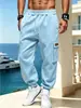 Pantalones jogger cargo para hombre europeos y americanos de bolsillo grande, cintura elástica, puños en el tobillo, venta al por mayor transfronteriza, productos de fábrica de comercio exterior
