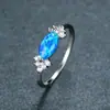 Deseo transfronterizo junio nuevo platino personalizado oval azul ópalo forma de caramelo para mujer todo-partido Anillo Fábrica al por mayor