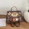 Nova Bolsa Transversal de Urso Estilosa 2026, Mochila de Design de Nicho Versátil e Fashion, Mochila Multifuncional na Moda