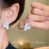 Aretes de Flor de Esmalte Blanco para Mujer Exquisitos de Nicho Versátiles Aretes con Sensación de Alta Gama Lujo Ligero Temperamento Nuevos Accesorios para Orejas Venta al por Mayor
