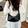 Bolso texturizado para mujer, nuevo modelo de verano 2026, bolso de hombro para ir al trabajo, diseño de nicho moderno y simple, bolso de hombro y cruzado