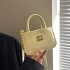 Bolso cuadrado pequeño y sencillo de mano, estilo coreano, bandolera con textura occidental, primavera 2025