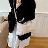 Bolso de mano pequeño fresco estilo japonés al por mayor para mujer, nuevo modelo de verano 2026, bolso de hombro único y texturizado, bolso cruzado para el trabajo