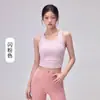 Top de yoga para mujer con cintura plisada, copas fijas que se mantienen en su lugar, elegante diseño de bloques de color y espalda cruzada