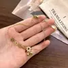 Tobillera de Monedas Chinas Estilo Nuevo para Mujer, Tobillera de Acero de Titanio con Cinco Monedas de Cobre para Mujer, No se Desvanece, Adornos de Pie con Campanillas de Alta Gama