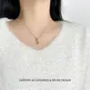 Exquisito Collar con Colgante de Flor de Cuatro Hojas Hueca con Microincrustaciones de Circonita, Cadena para Clavícula Versátil de Lujo Ligero de Nicho