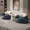 Mesa y sillas de negociación modernas de lujo ligero para sala de estar, balcón, dormitorio, salón de belleza, tienda de ropa, silla individual de cuero con diseño de garra de gato