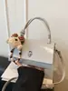 Bolso coreano de nicho, nueva moda verano 2026, bandolera de color sólido texturizado, bolso de mujer elegante de alto valor