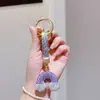 Chaveiro de Cristal Cravejado com Diamantes Formato Arco-Íris Porta-Chaves de Carro Pingente de Decoração para Bolsa Pingente de Chave Laço