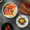 Tigelas de arroz criativas minimalistas em cerâmica preto e branco estilo japonês, adequadas para uso doméstico, em hotéis e comercial, disponíveis para atacado, esteticamente agradáveis e projetadas como um conjunto para casal com motivo de folha de lótus