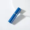 Botella pulverizadora de vidrio de 5 ml con cabezal plano desmontable y carcasa de ABS en stock para dispensar cosméticos y perfume, botella de perfume vacía