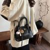 Bolsas de mão texturizadas de cor pura para mulheres 2025 outono e inverno novo estilo estilo estrangeiro bolsa de ombro da moda estilo estrangeiro roupas de trabalho crossbody
