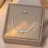 Pulsera de Acero de Titanio con Mariposa de Diamantes Completos Super Brillante Estilo Coreano y Japonés para Mujer, Lujo Ligero, Exquisita Versátil de Gama Alta Estilo Estrella de Hada Hada