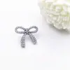 Accesorios de ropa al por mayor broche corsage con lazo de perla insignia hebilla anti-luz pasador de solapa