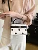 Bolso versátil de moda transfronterizo 2026 verano nuevo nicho bolsa cuadrada pequeña bolso de hombro con un toque de alta gama bolso cruzado