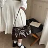 Bolso pequeño plisado para mujer 2026 nuevo versión coreana transfronteriza versátil para el trabajo y el día a día bolso de axila elegante nicho bolso nube al por mayor