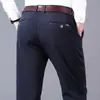 Calça casual masculina plus size altamente elástica, calça comprida para homens grandes, elástica, adequada para primavera e outono, tamanho 42, cintura alta, tamanho extra grande