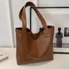 Bolsos populares de este año para mujer, bolsos tote para el trabajo para mujer, bolsos tote de un solo hombro de nicho francés de Instagram para mujer