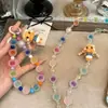 Super linda niña llorando colorida cadena de teléfono con cuentas para colgar en el cuerpo bolso colgante estilo Ins diseño de nicho cadena de teléfono
