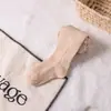 Medias Finas para Niñas de Primavera y Otoño Leggings Infantiles Transfronterizos 100% Poliéster con Diseño de Giro Lateral Medias Lisas para Bebés