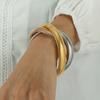 Nueva pulsera de cuerda de tres capas de acero de titanio transfronteriza, ligera, de lujo, elegante, de acero inoxidable, resistente al agua, chapada en oro de 18 quilates.