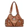 Bolso de Motocicleta Retro de Cuero Suave Transfronterizo 2026 Nuevo Bolso Cruzado de Hombro Moderno Europeo y Americano Bolso de Mujer de Alta Calidad de Gran Capacidad