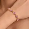 Pulsera de trébol de cuatro hojas con cruz de circonita para mujer, dulce, de alta gama, nicho, versátil para Instagram, joyería para mano con flor