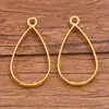 16 Estilos de Accesorios para Joyería DIY de Aleación Imitación Oro, Colgantes con Forma de Luna, Redondos y de Corazón con Marcos Huecos de Resina