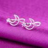 Pendientes de moda de AliExpress con exquisitos diamantes, forma de luna hueca, con clip para las orejas, dulces y sencillos, para mujer, venta al por mayor