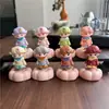 Dibujos Animados Populares de Vendedores Ambulantes Juguetes Giratorios de Resina Adornos para Escritorio para Aliviar el Estrés Juguetes Giratorios de Cerámica Lote Mixto Multicolor