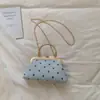 Bolsa de Mão Estilo Chanel Vintage 2026 Verão Novo Estilo Floresta Moda Nicho Design Corrente Transversal Bolsa Concha
