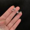 Pendientes de moda simples con clip de oreja de estrella de alto sentido para mujer, pendientes de viento frío simples con temperamento de Joker, pendientes con personalidad al por mayor