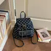 Mochila de Bolinhas Nova Verão 2026 Moda Leve Nicho Bolsa Escolar Bolsa com Aba Bolsa Feminina Bolsa de Aula Mochila