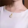 Plata S925 Chapada Xiangyun Ruyi Oro Gufa Jade Hetian Sonido Vibratorio Red Social Hebilla de Seguridad Colgante de Collar para Mujer Colgante