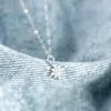 Collar Yinyiyuanyuan de plata de ley S925 con diseño integral de estrella de ocho puntas para mujer, exquisito colgante de copo de nieve, superventas transfronterizo, cadena versátil para la clavícula