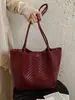 Bolso tote tejido Yuezhi 2026 verano nuevo estilo coreano moderno bolsa de mano de gran capacidad bolso de hombro simple moda bolso para mujer