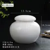 Cerámica de Porcelana Blanca Hogareña Sellada Lata de Té Almacenamiento Portátil Viaje Almacenamiento de Té Simple Pequeño Almacenamiento a Prueba de Humedad