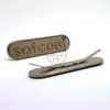 Etiquetas de Logo de Metal com Pés para Bolsas, Etiquetas de Liga de Zinco, Placas de Etiqueta para Sapatos e Roupas de Venda Direta, Letras de Ferragens Galvanizadas